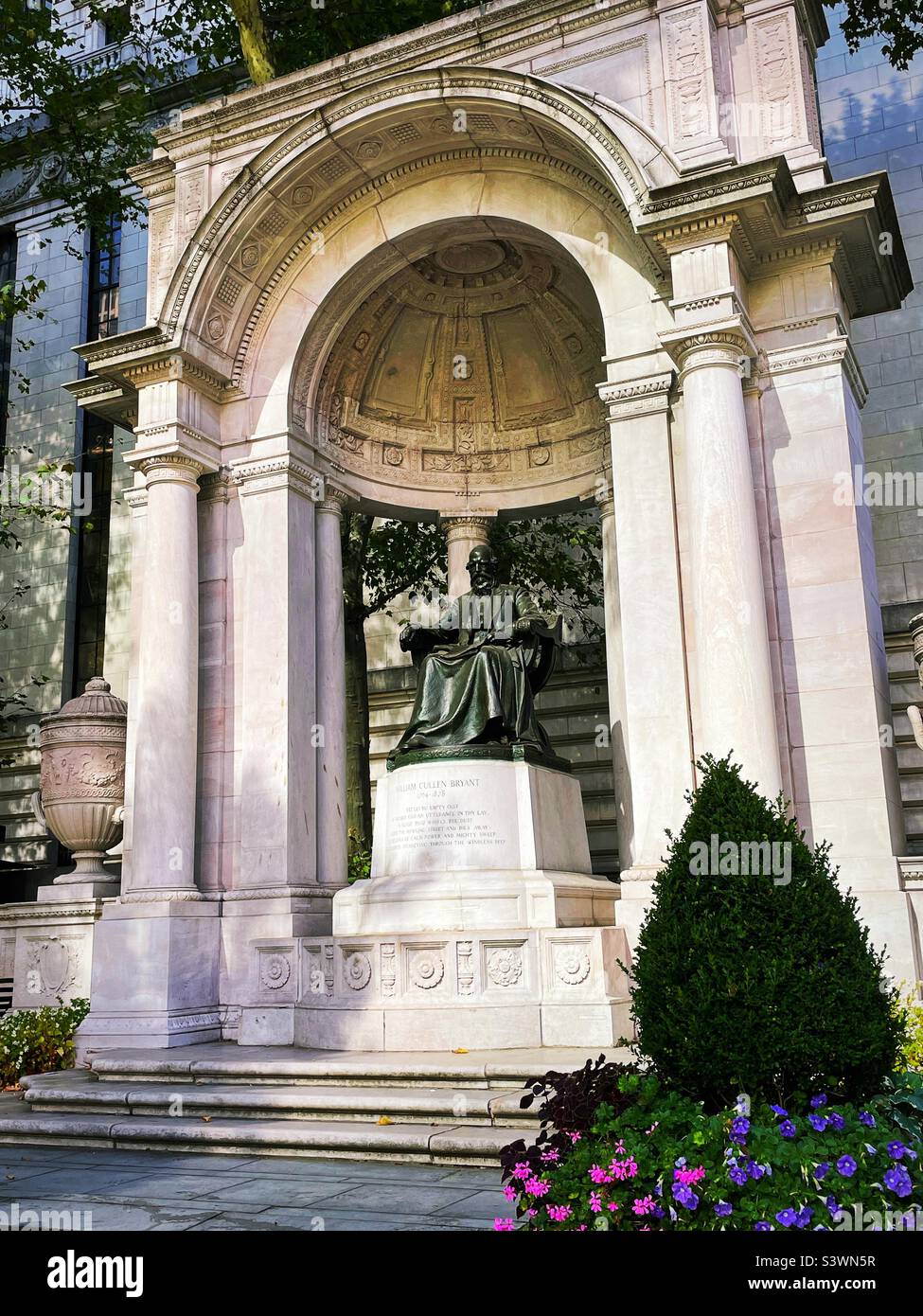 The statue of William Cullen Bryant is in the park named after him Bryant Park, 2022, New York City, USA Stock Photo