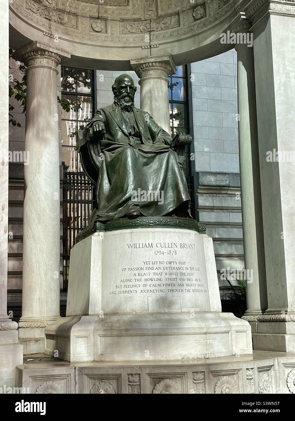 Imposing bronze statue of William Cullen Bryant prominently displayed in Bryant Park behind the new York public library, 2022, New York City, USA Stock Photo