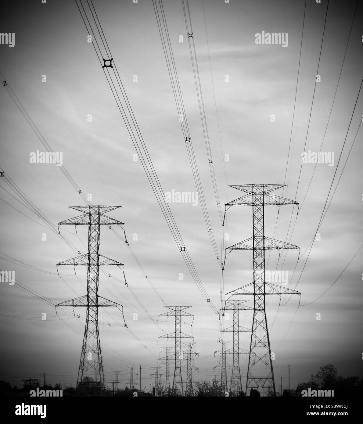 Heavy duty steel hydro power towers in vignette. - Smartphone Captured Stock Image