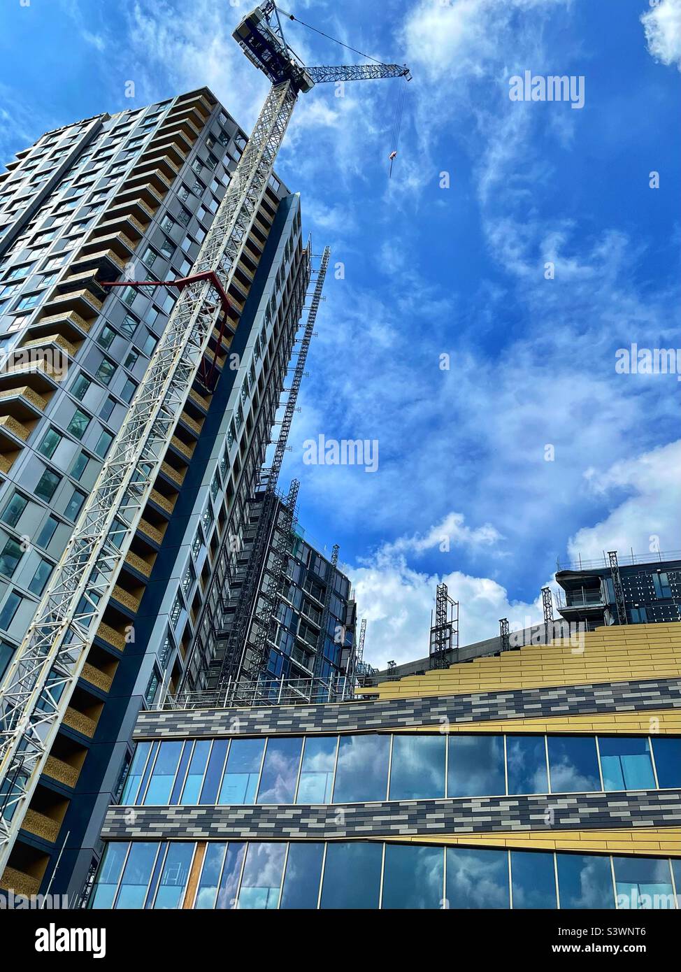 Lewisham Gateway development near Lewisham railway station - different styles of modern towers juxtaposed - gold coloured cladding - Smartphone Captured Stock Image