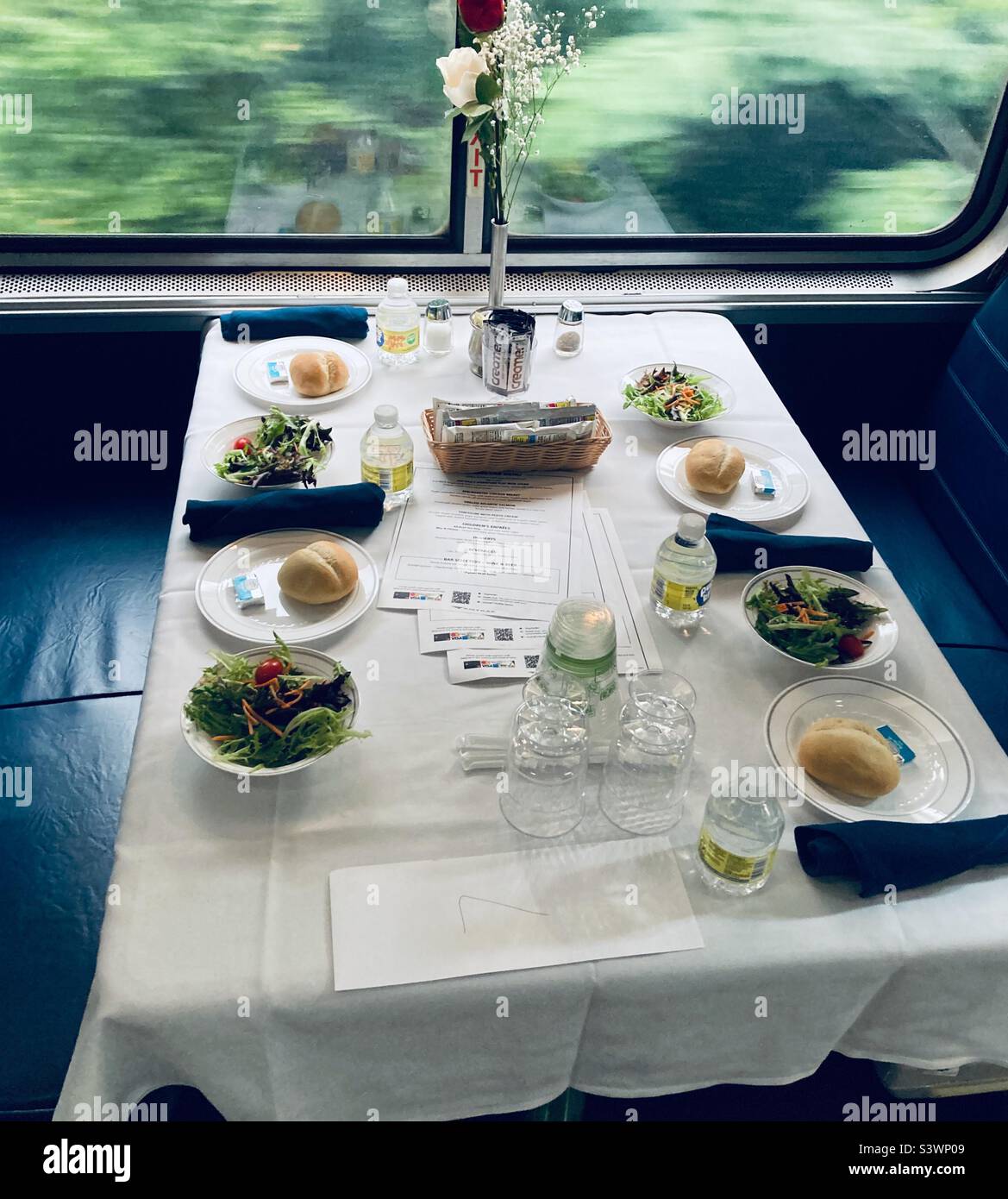 A table setting of formal dining service on the rail cars Stock Photo