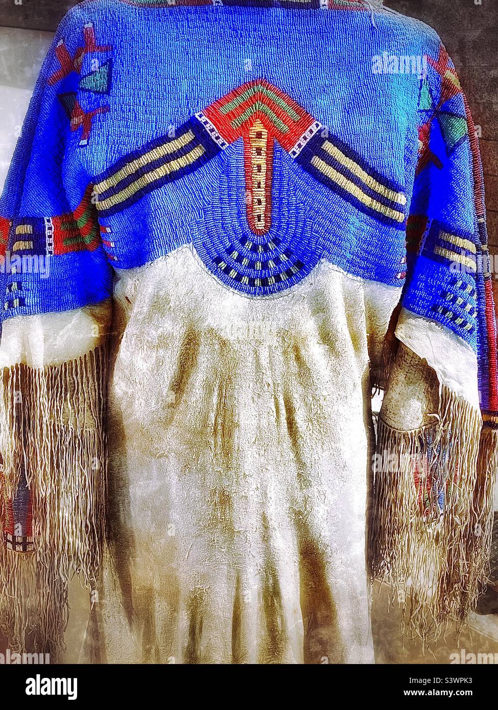 Indian artifacts and handicrafts displayed at the Natural History Museum and Dinosaur Museum in Vernal, Utah, USA. Grunge and color select effects digitally added for artistic effect. - Smartphone Captured Stock Image