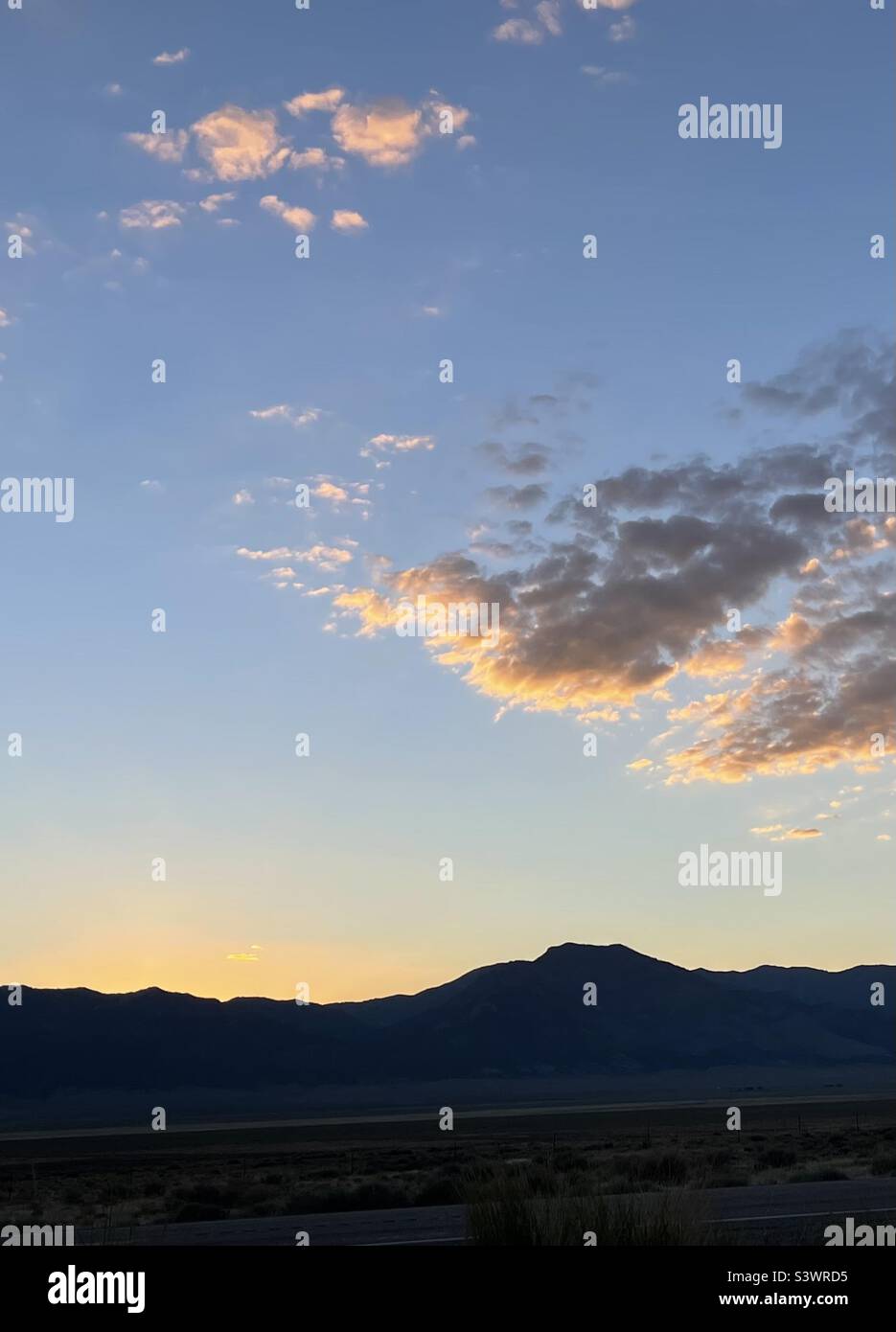 Clouds dappled with sun Stock Photo - Alamy