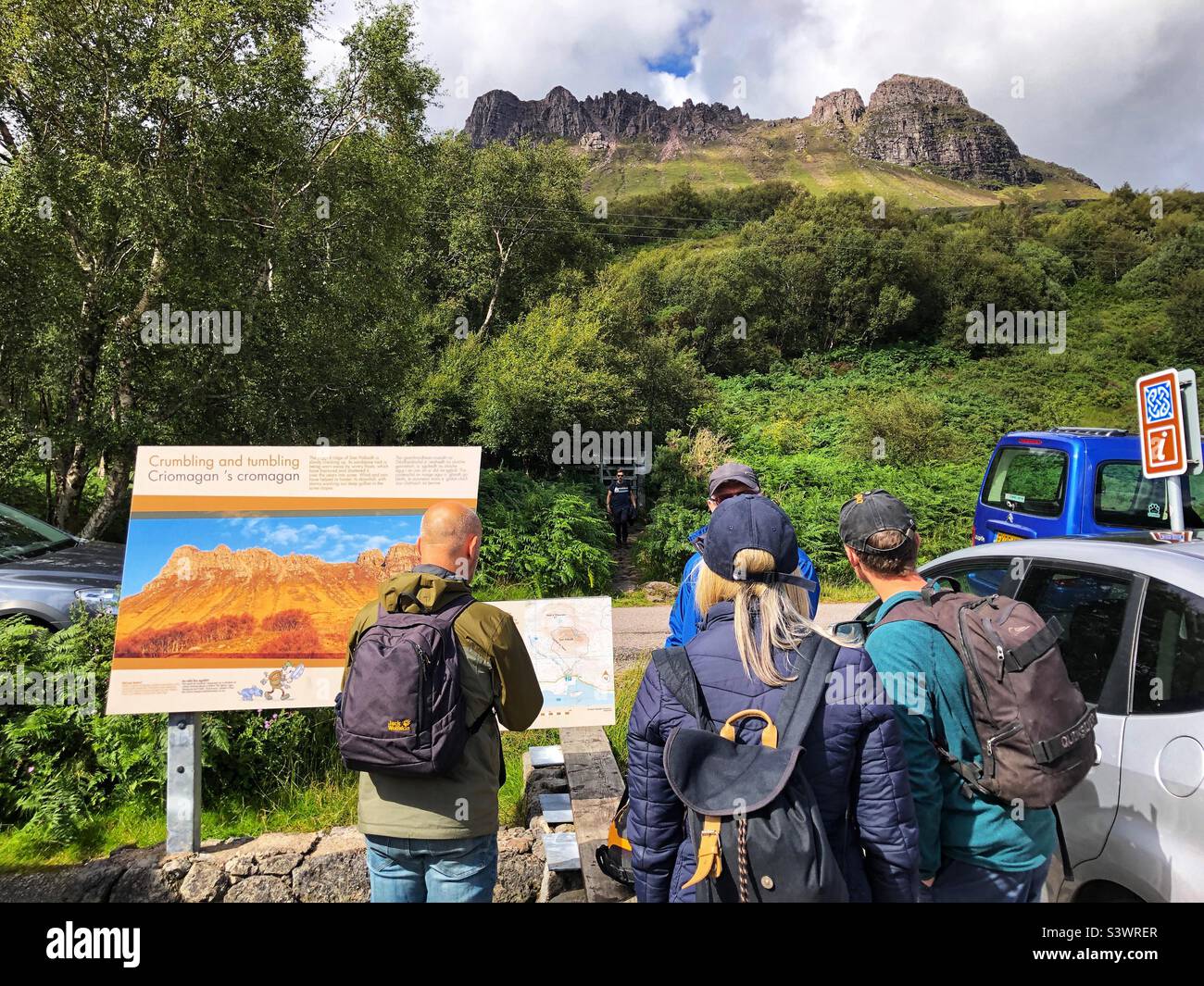 Walkers about to set off on the path to Stac Pollaidh or Stack Polly, viewed from the south, mountain in Inverpolly, North West Scotland - Smartphone Captured Stock Image