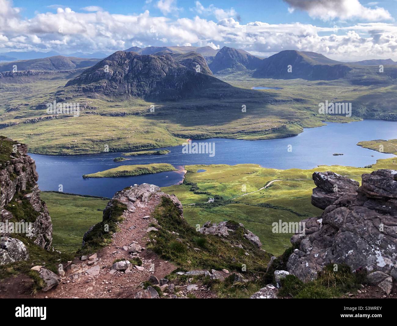 The Mountains of Inverpolly estate and Loch Lurgainn viewed from the ridge of Stac Pollaidh, North West Scotland - Smartphone Captured Stock Image