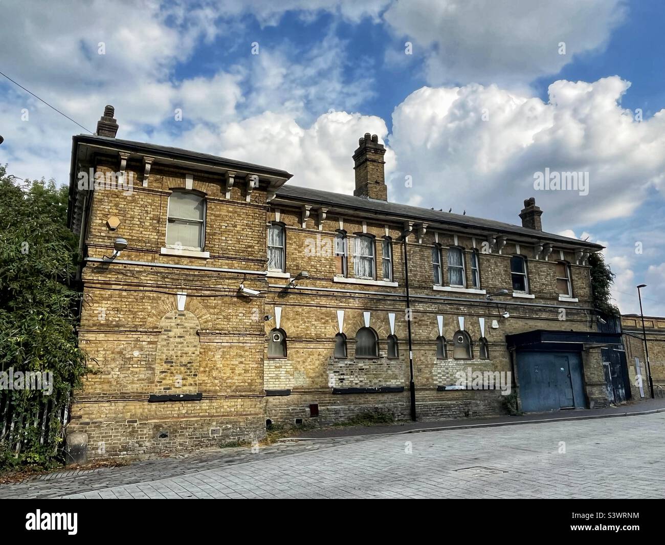 Catford Bridge Staton, Catford, London, SE6 fine Victorian building on the up platform to London Charing Cross boarded and not in use, summer 2022. - Smartphone Captured Stock Image