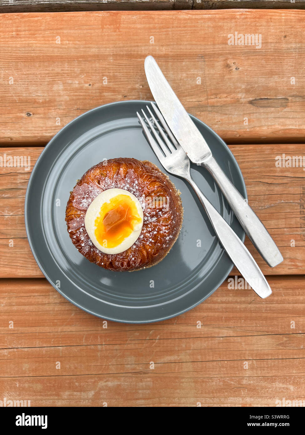 Passion fruit pastry from Jinju Patisserie in Portland, Oregon on Saturday, August 20, 2022. - Smartphone Captured Stock Image