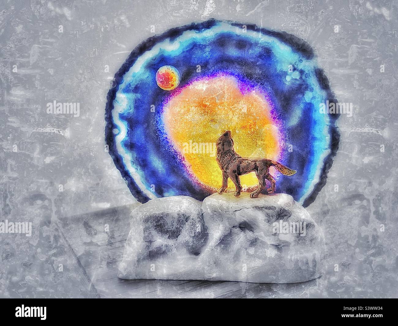 A piece of southwestern home decor that acts as a candle holder. Grunge and color (candle glow) have been digitally added for artistic effect. - Smartphone Captured Stock Image