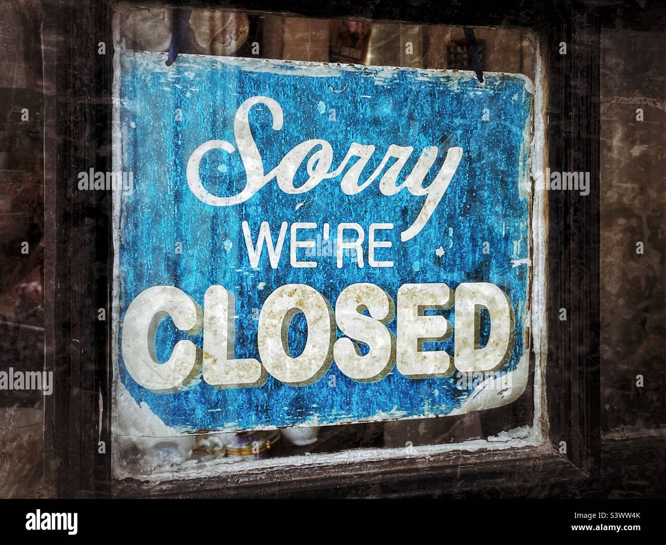 Sorry We’re Closed. The sign in a retail shop window. Closed for business. Closed for retail sales. Photo ©️ COLIN HOSKINS. Stock Photo