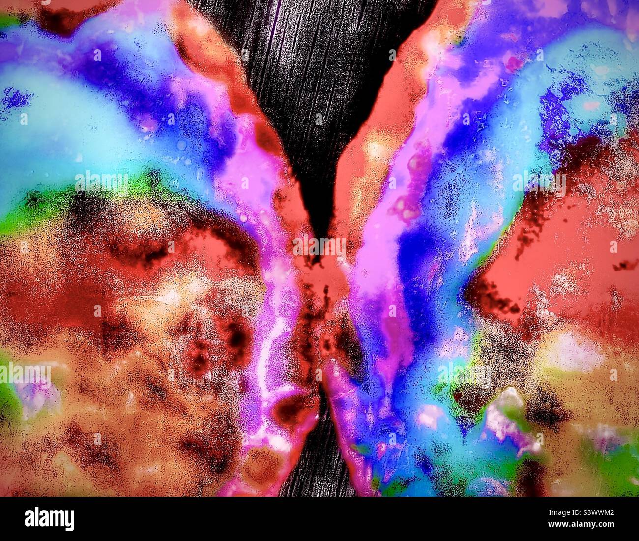 An opened geode with the two halves side by side. Heavily altered and enhanced via various IOS apps to become a colorful, psychedelic abstract. - Smartphone Captured Stock Image
