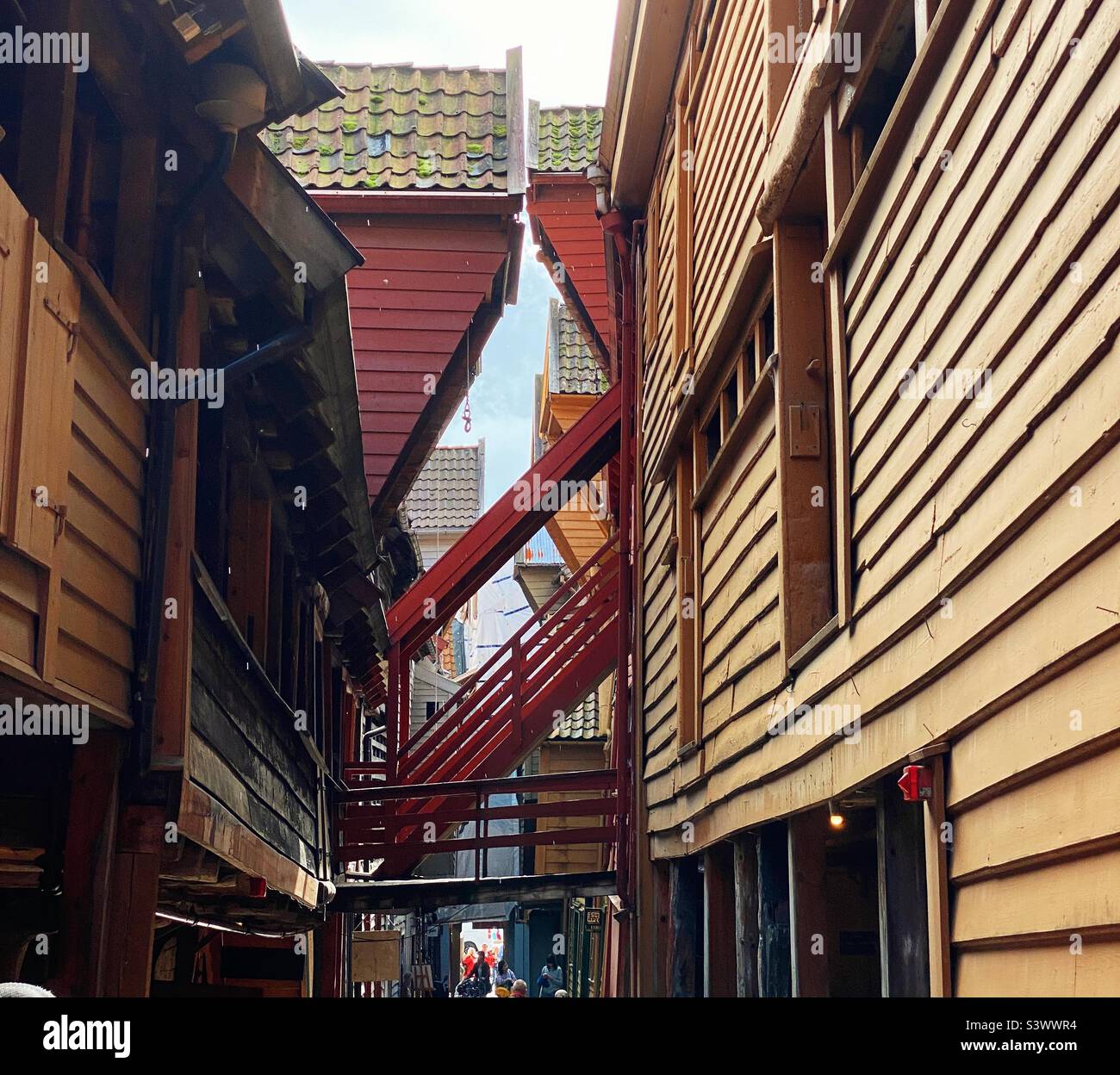 Alleyway in the historic hanseatic harbour, Bryggen, in Bergen, Norway Stock Photo