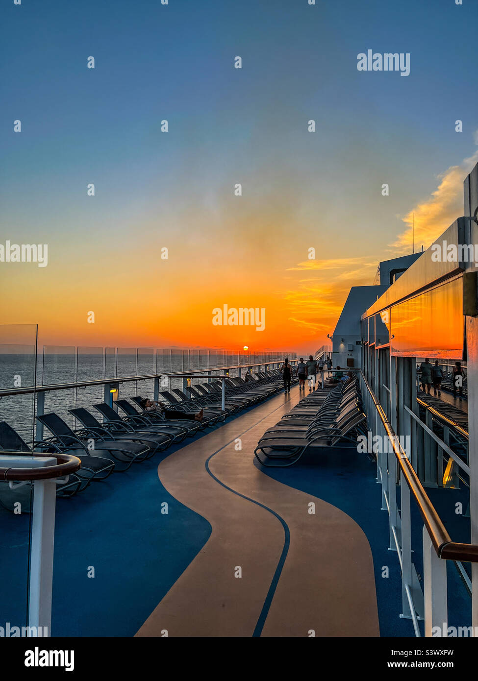 Sunset in the Atlantic Ocean on Royal Caribbean Anthem of the Seas deck ...