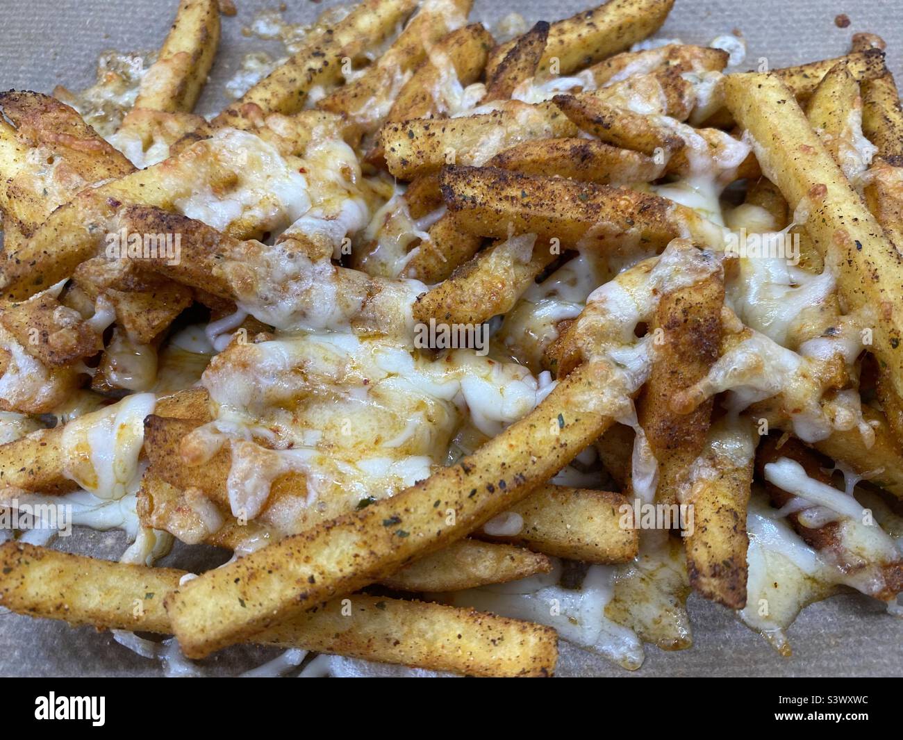 Dirty Salt and Pepper Fries cheesy fries Stock Photo Alamy