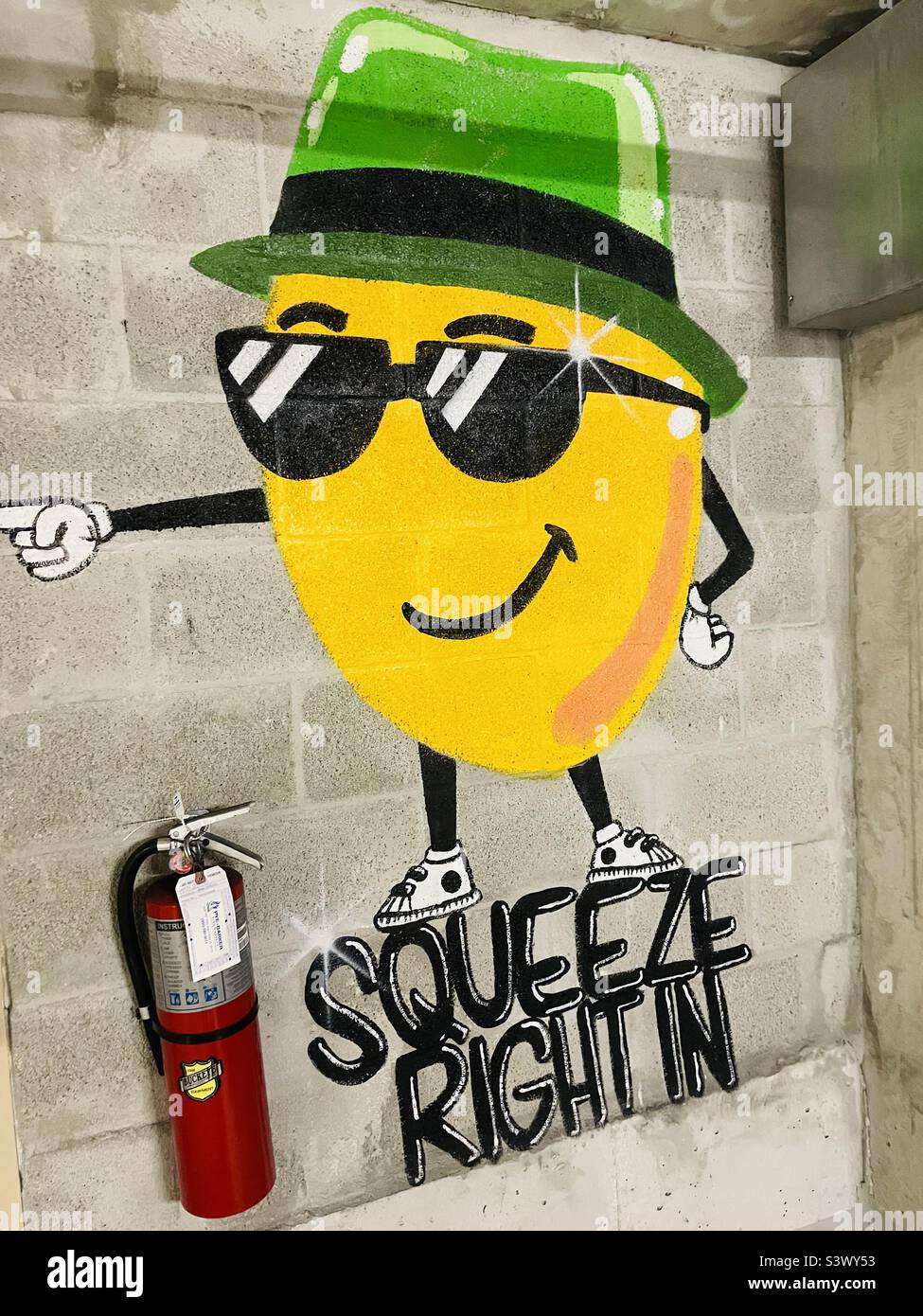 Funny parking sign illustration at Trader Joe’s in Miami Florida Florida USA - Smartphone Captured Stock Image