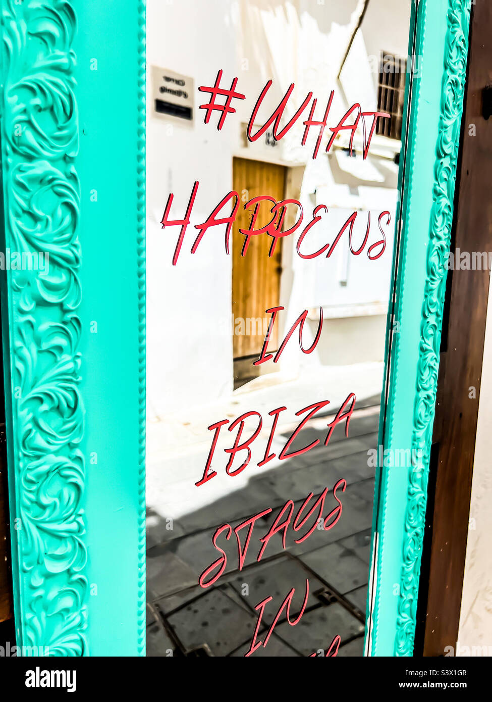 #what happens in Ibiza stays in Ibiza on a mirror in Ibiza - Smartphone Captured Stock Image