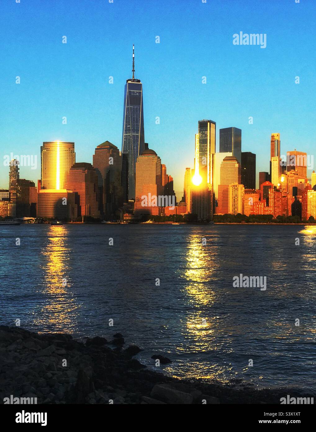 Sunset reflections and the Lower Manhattan Stock Photo