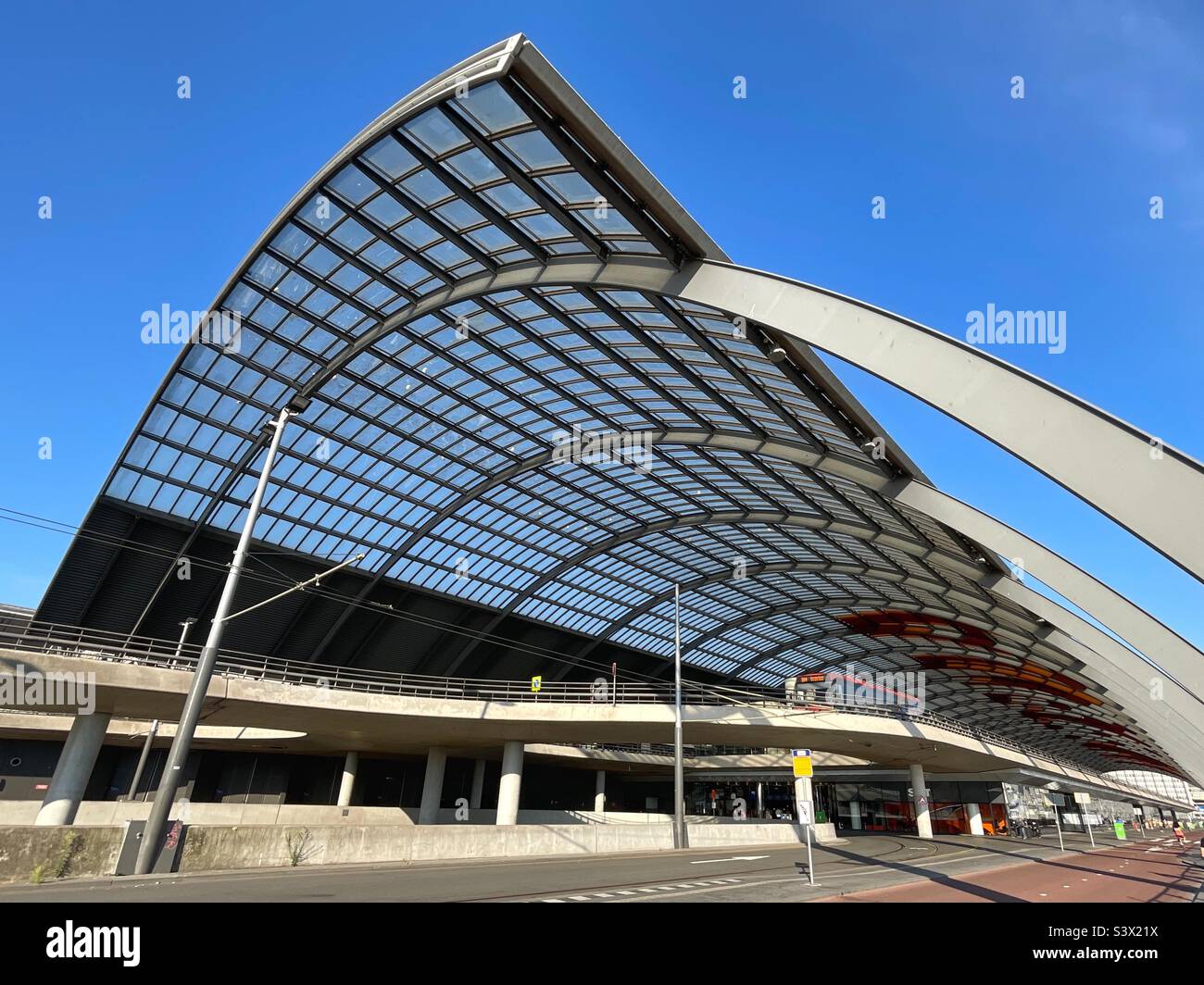 Curved roof of the bus station at Amsterdam’s Centraale railway station Stock Photo