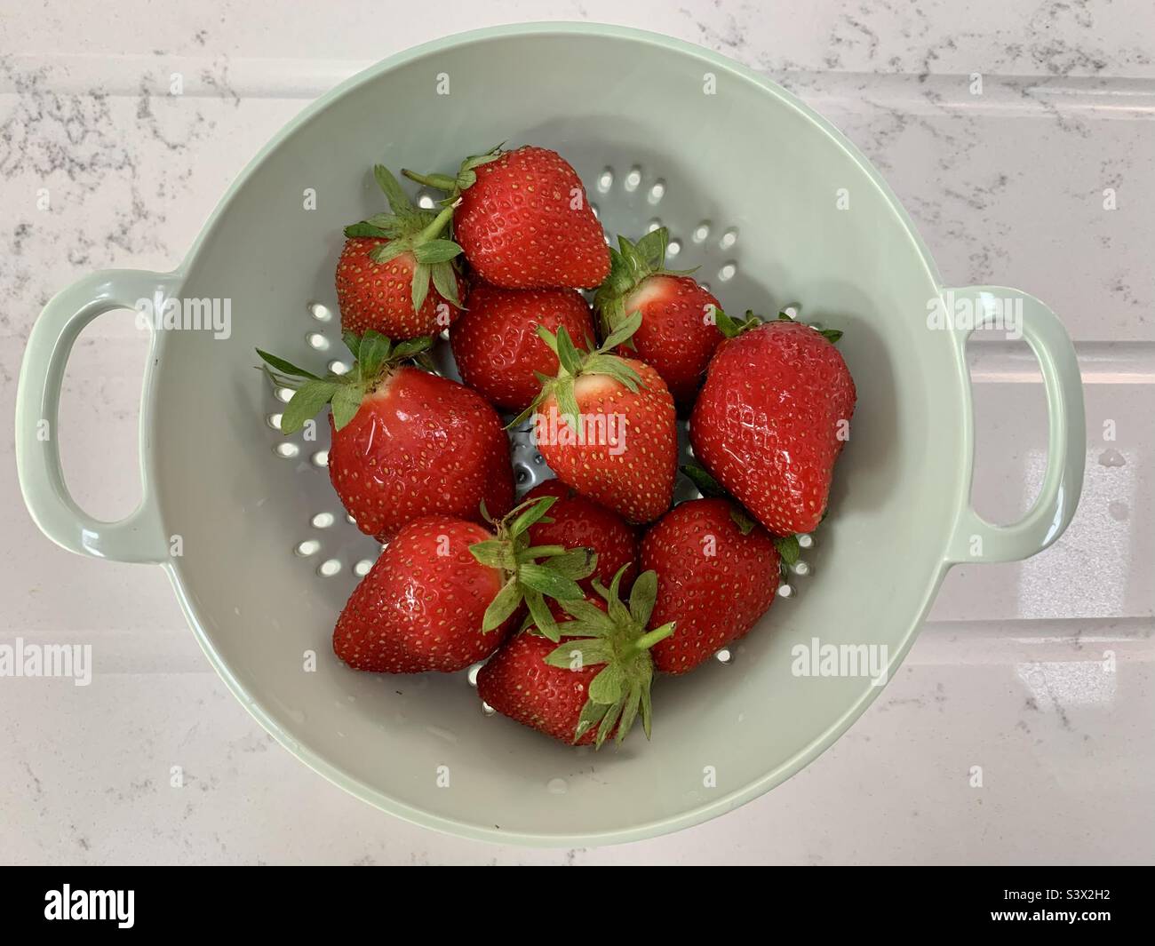 Strawberries in a colander - Smartphone Captured Stock Image