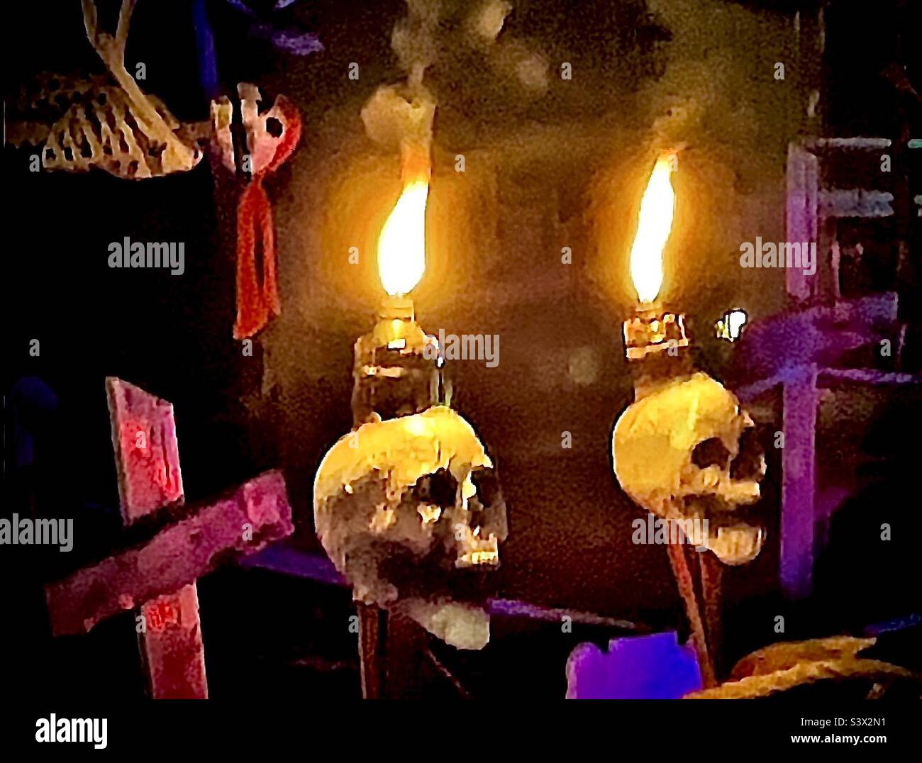 One homeowner in a Utah, USA neighborhood goes all out to decorate his yard during the Halloween season. With much to choose from, here is sampling of some of his decor on display, with a pirate theme - Smartphone Captured Stock Image