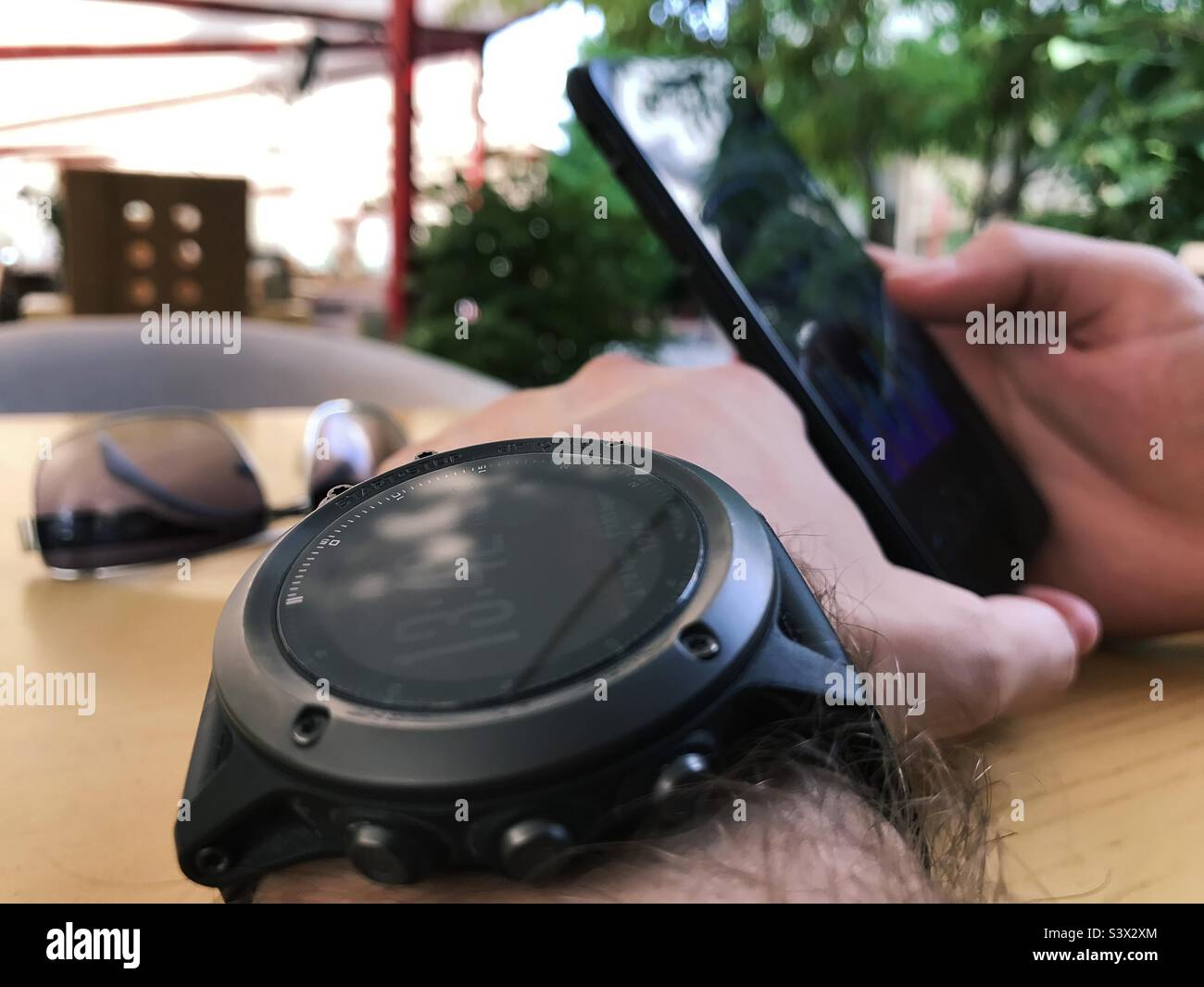 Smart watch on male hand - Smartphone Captured Stock Image