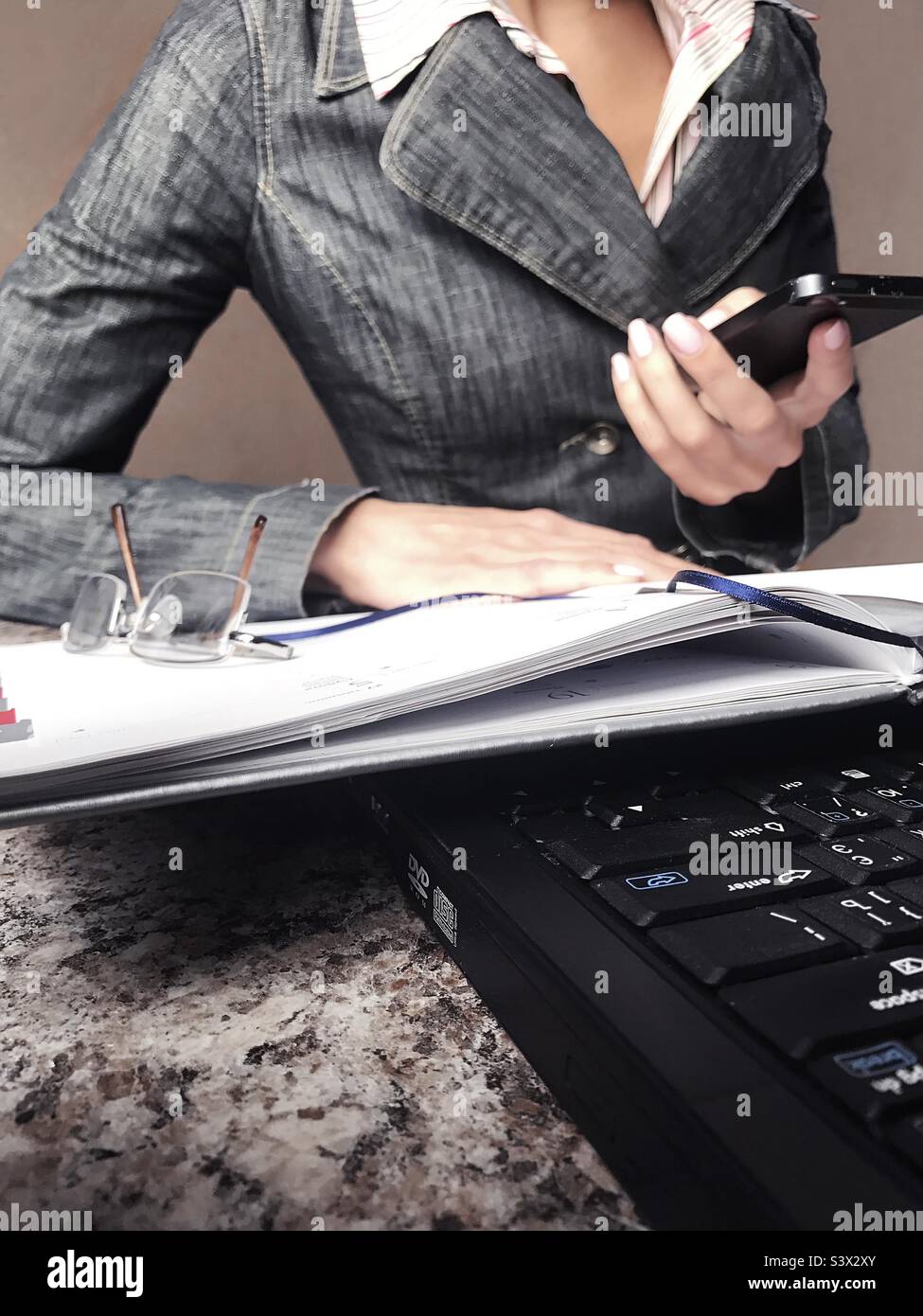 Business woman in office - Smartphone Captured Stock Image