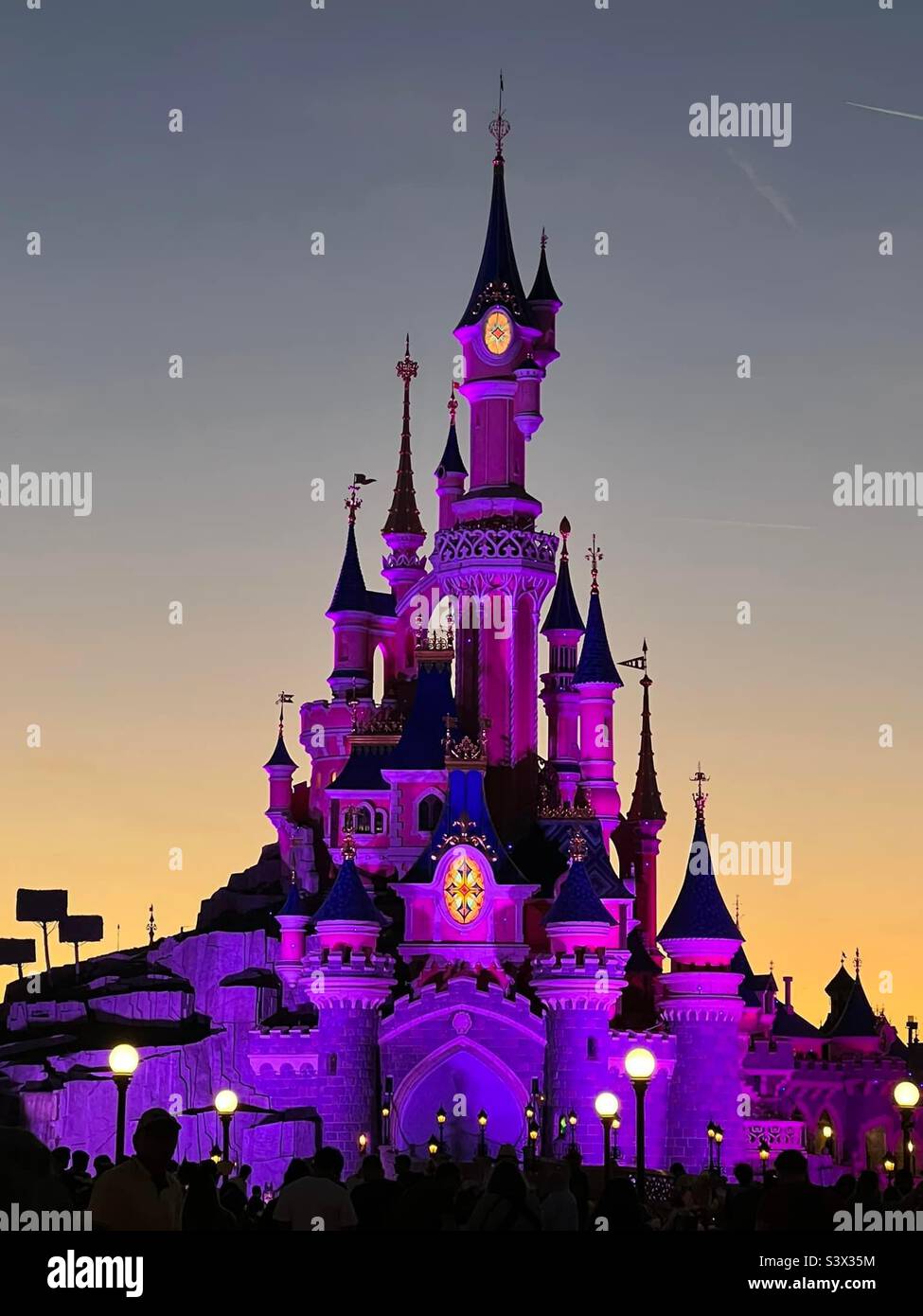 Disney castle at sunset hi-res stock photography and images - Alamy