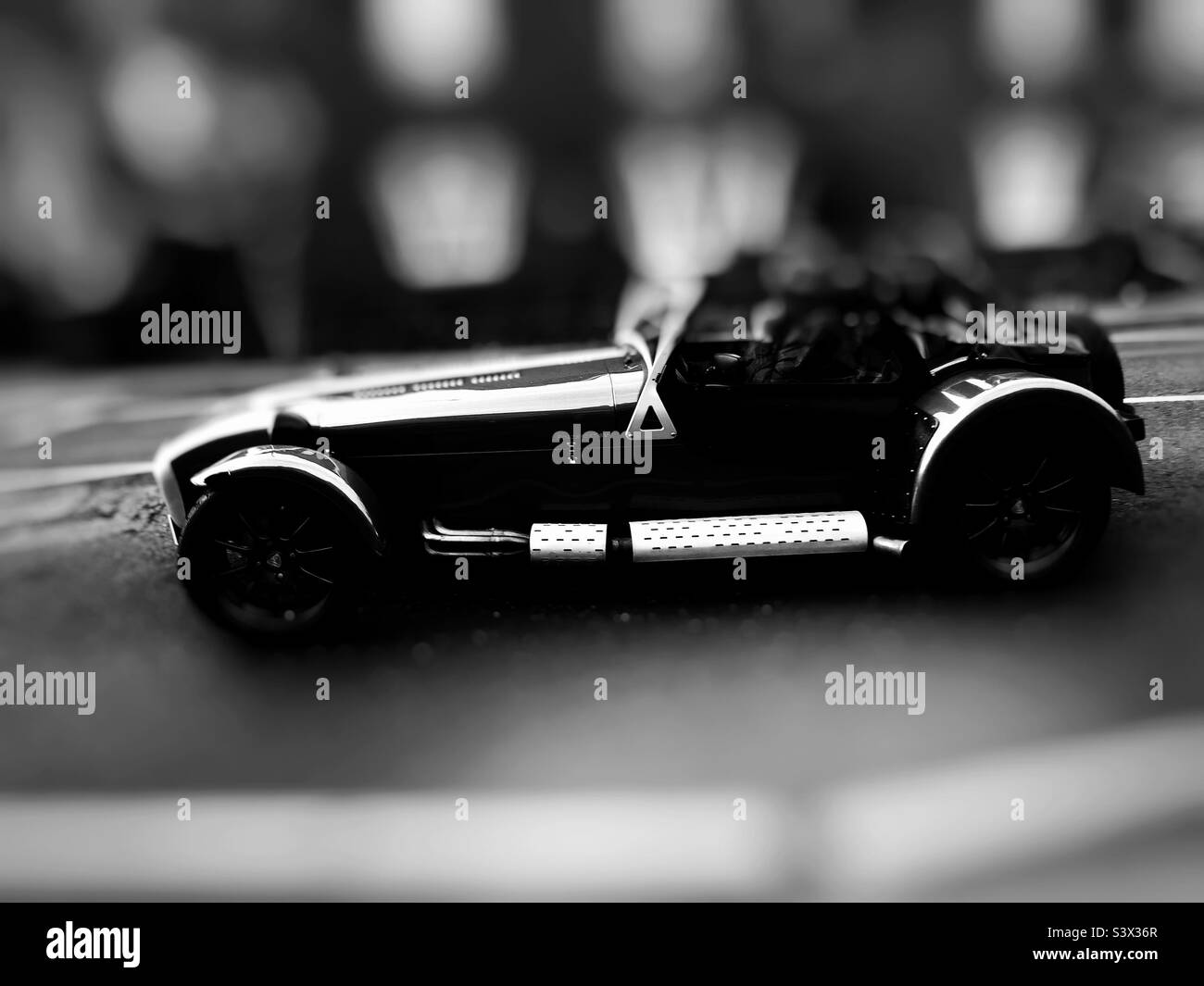 Black noire image of a Vintage sports car with shallow dept of field - Smartphone Captured Stock Image