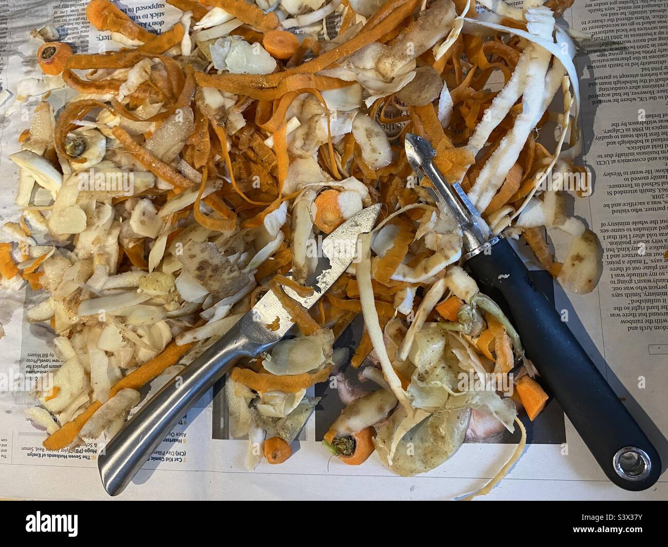 Vegetable peelings on a newspaper Stock Photo Alamy