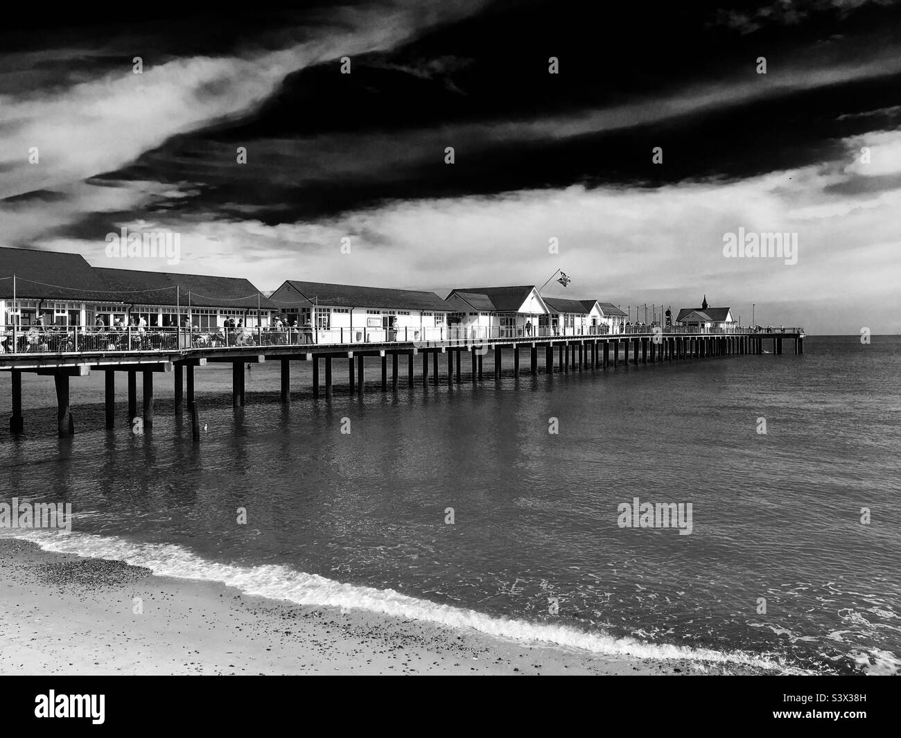 A dramatic photo of Southwold pier, Suffolk on a bright sunny day. Shot ...