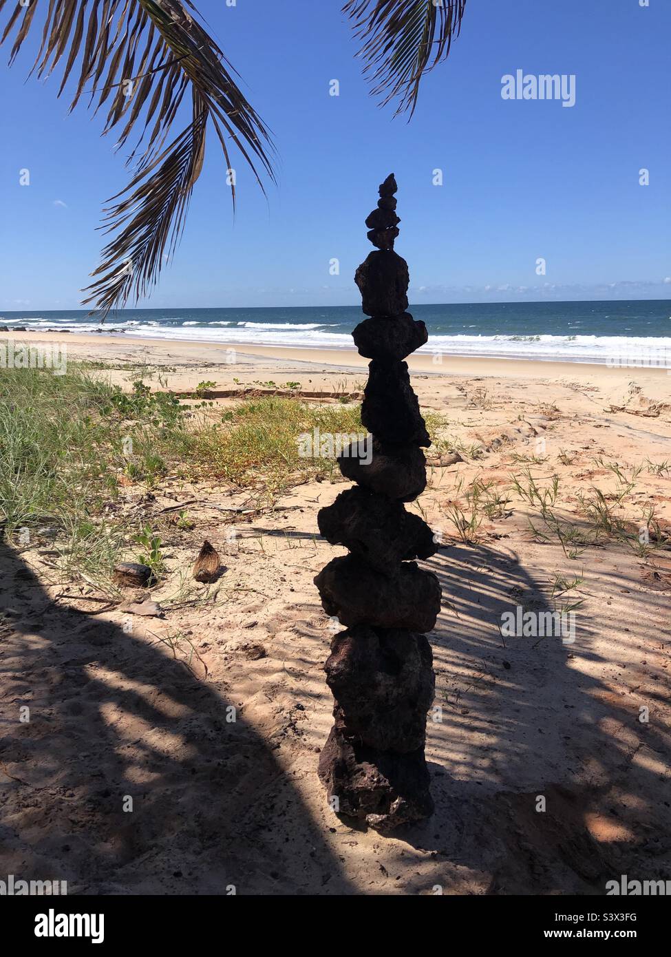 Balancing rocks on the beach. Stock Photo