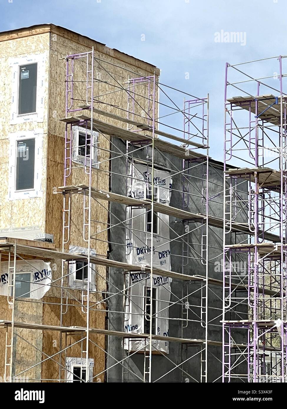 These townhomes, apts. or whatever other housing units, are going up all over the place, at least in Utah, at an ever increasing pace. Apparently to ease the lack of affordable housing. - Smartphone Captured Stock Image