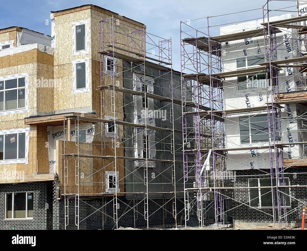 These townhomes, apts. or whatever other housing units, are going up all over the place, at least in Utah, at an ever increasing pace. Apparently to ease the lack of affordable housing. - Smartphone Captured Stock Image