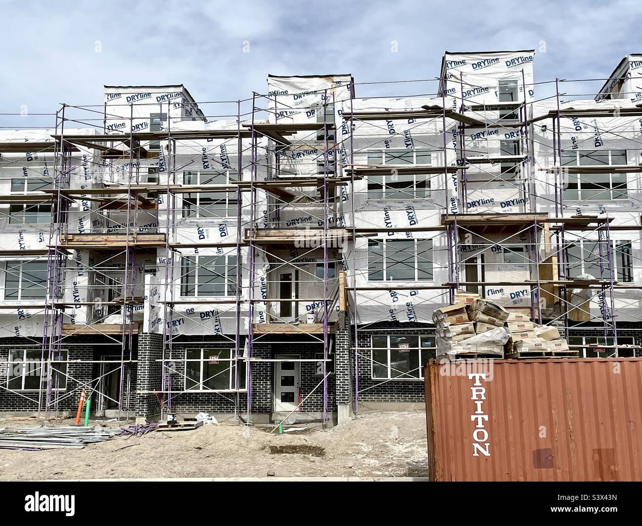 These townhomes, apts. or whatever other housing units, are going up all over the place, at least in Utah, at an ever increasing pace. Apparently to ease the lack of affordable housing. - Smartphone Captured Stock Image