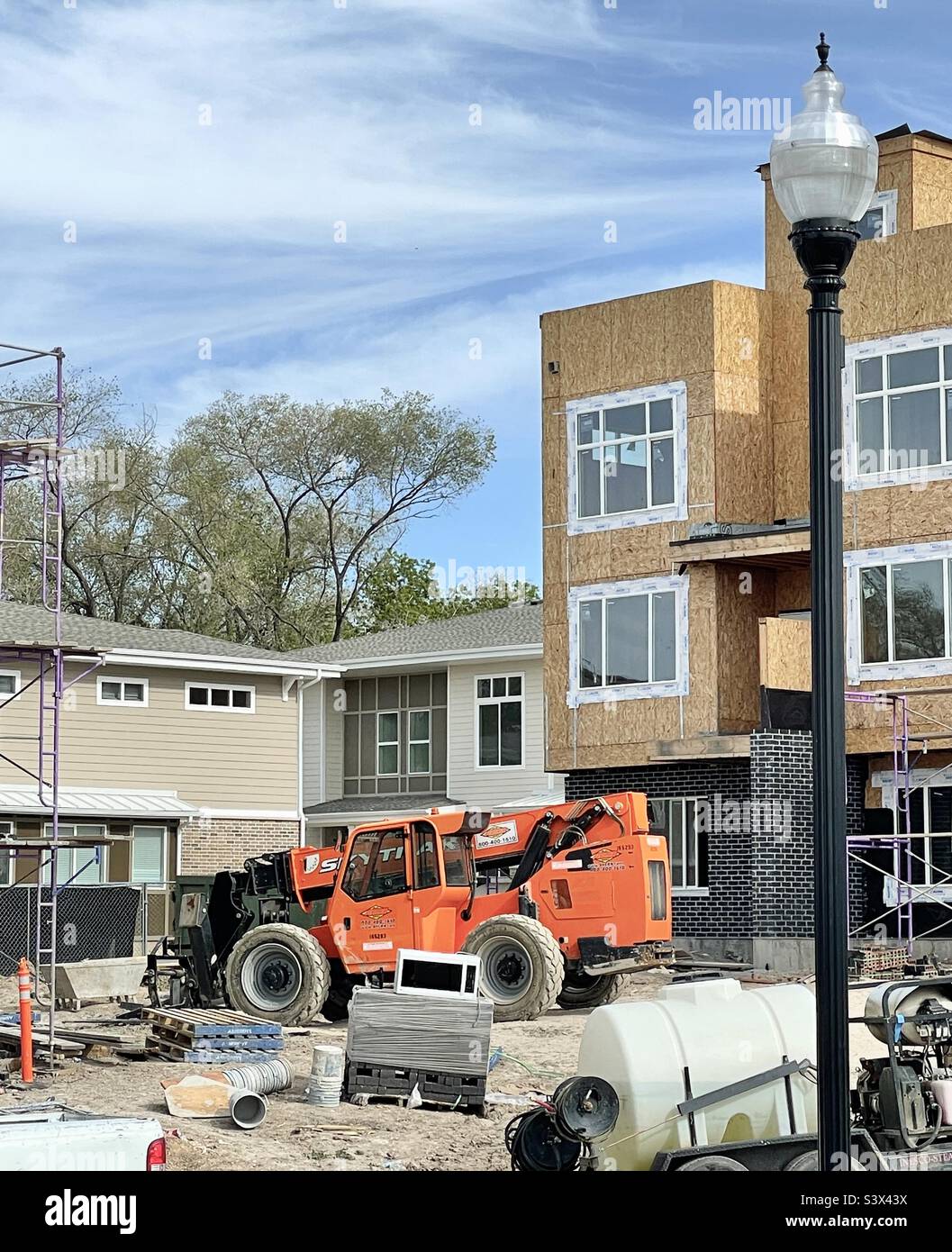 These townhomes, apts. or whatever other housing units, are going up all over the place, at least in Utah, at an ever increasing pace. Apparently to ease the lack of affordable housing. - Smartphone Captured Stock Image