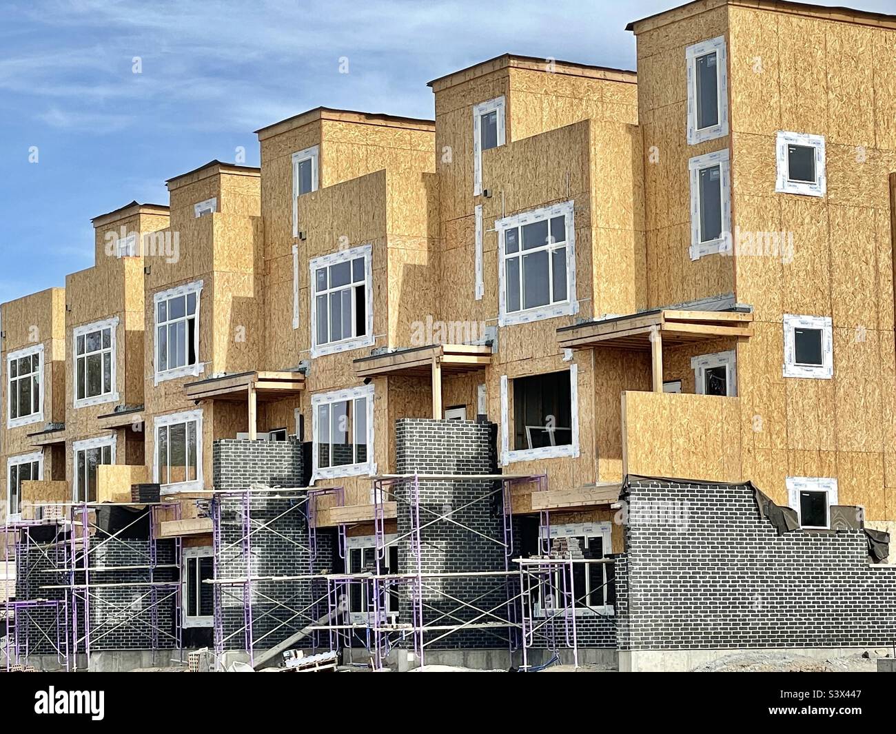 Housing units going up very quickly here in Utah, all over the place. A housing crisis of high cost of living and low availability of housing, hopefully this boom will help. - Smartphone Captured Stock Image