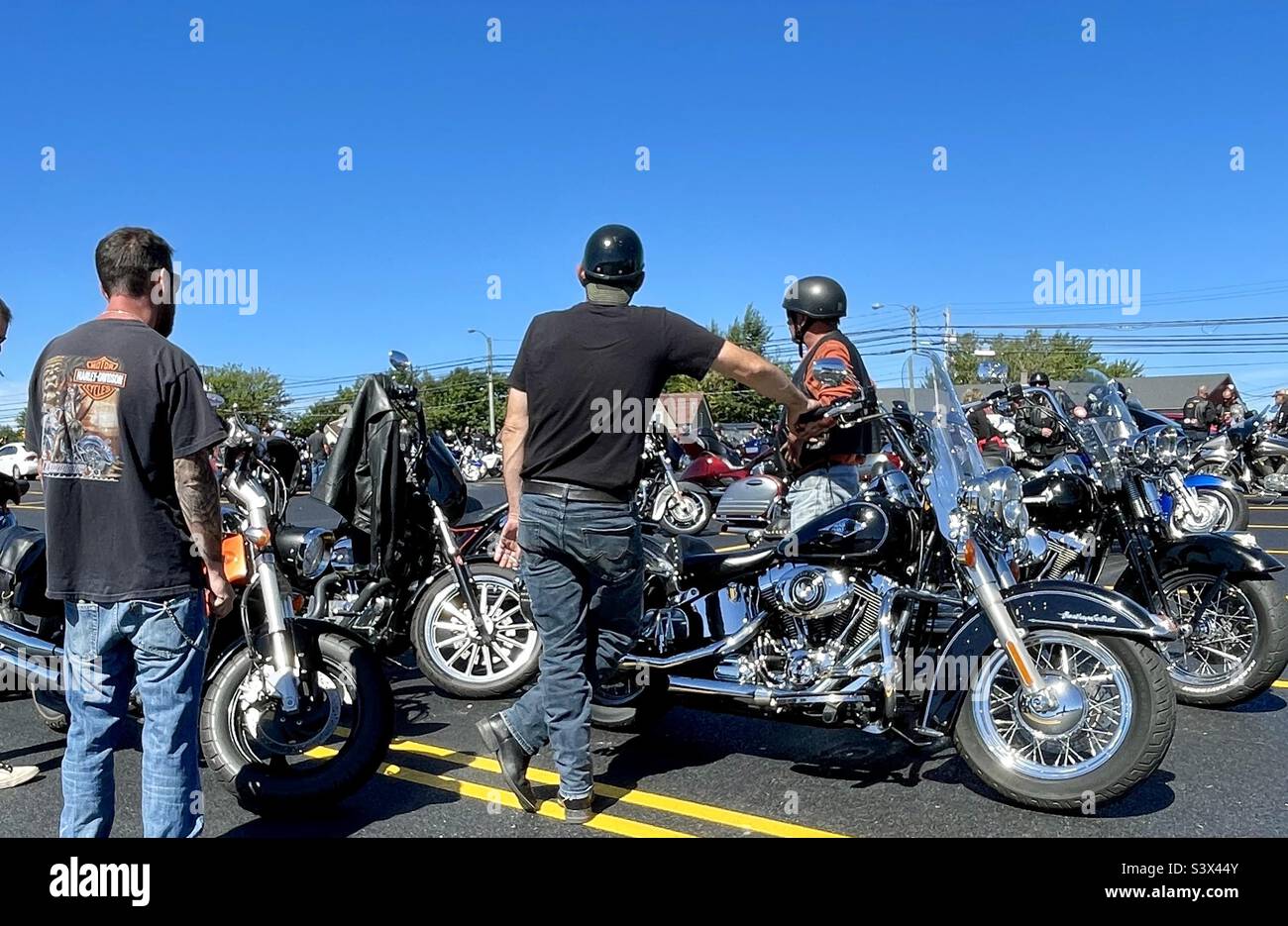 Bikers arrive at Wharf Rat Rally in Digby, Nova Scotia on September 2, 2022. - Smartphone Captured Stock Image