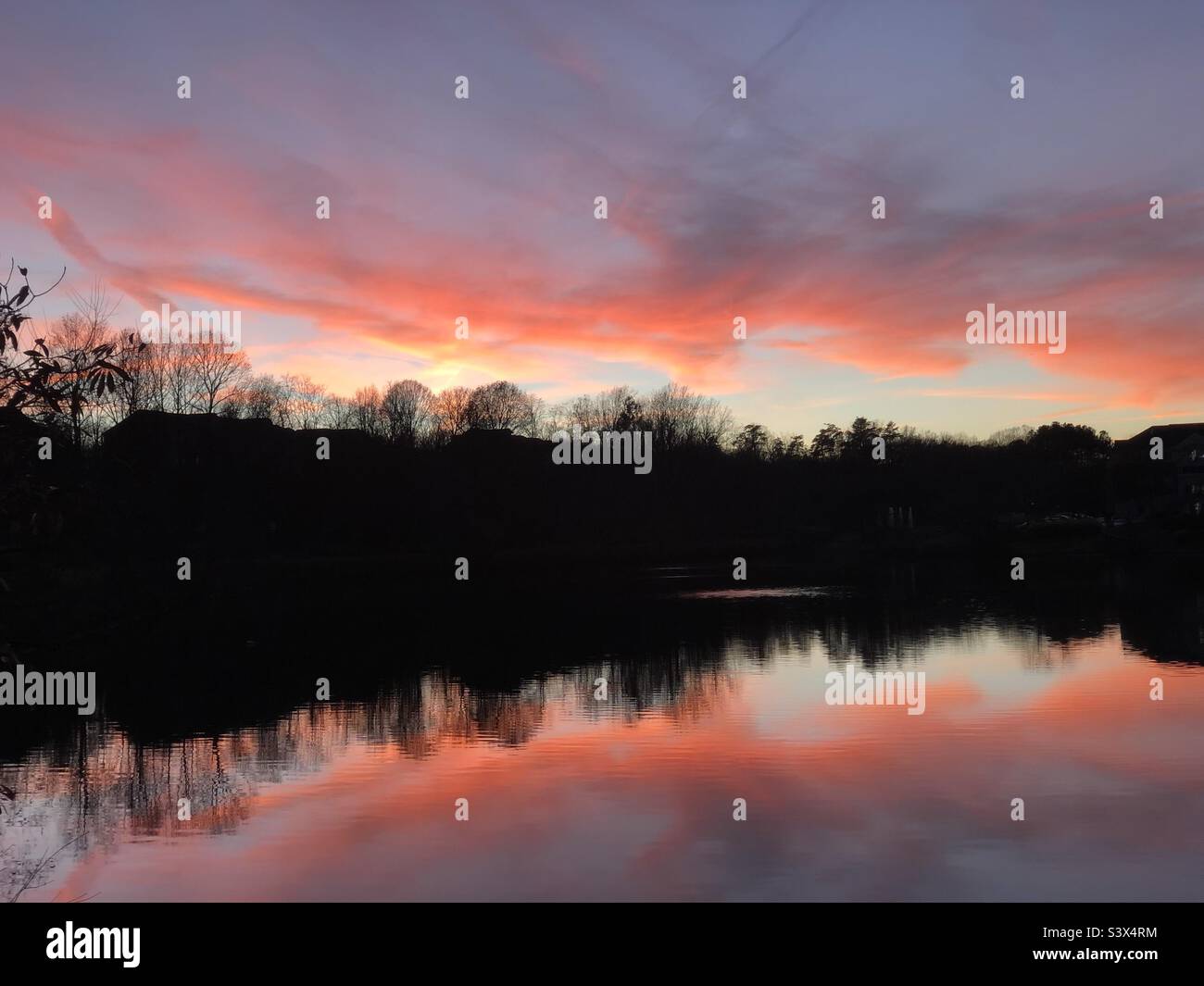 Sunset sky on fire Stock Photo - Alamy