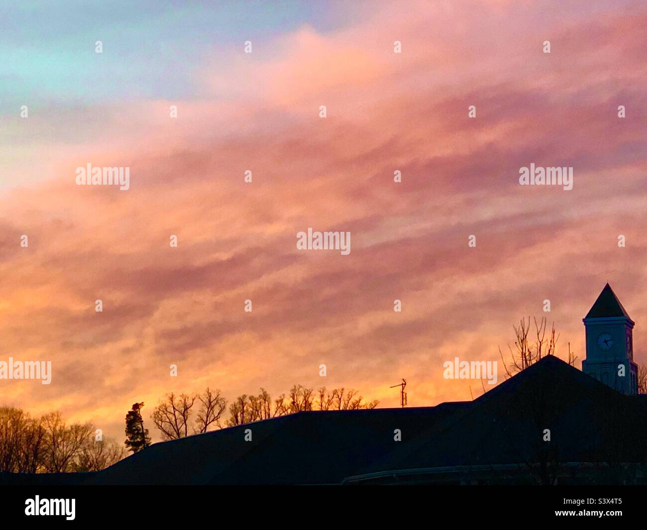Church steeple and sunset sky - Smartphone Captured Stock Image