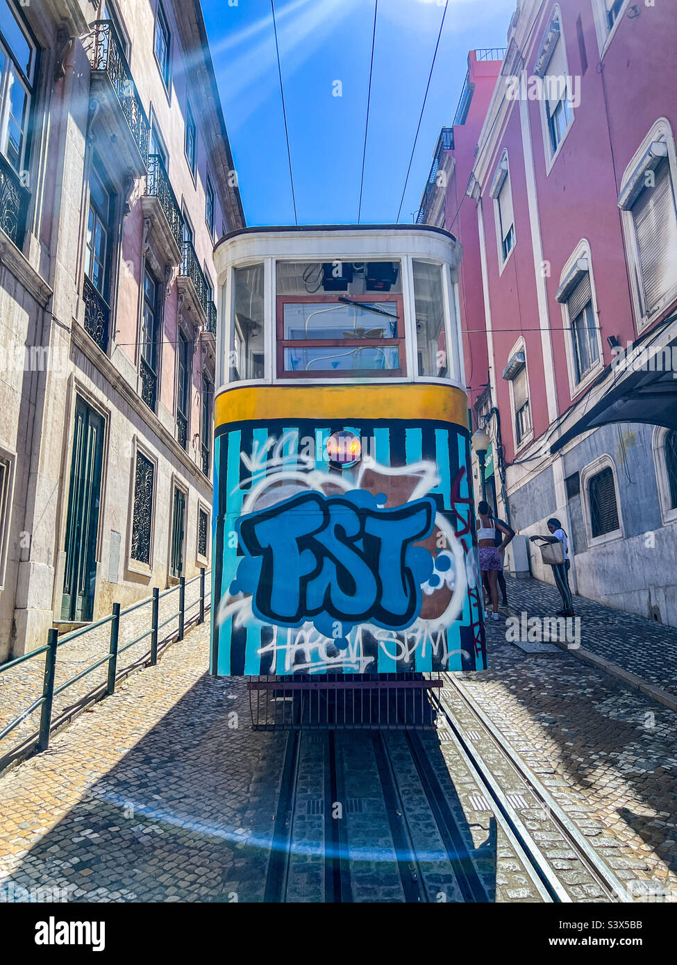 Gloria Funicular cable car a popular tourist attraction in Lisbon city centre in Portugal - Smartphone Captured Stock Image