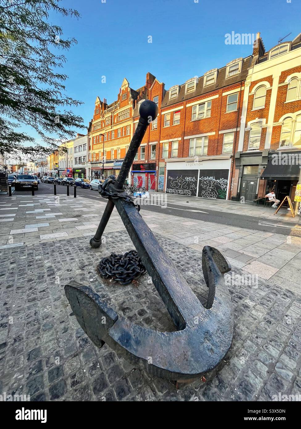 Deptford anchor on Deptford High Street symbolic of the naval history of London on the river Thames. The return of the anchor to this site followed a community campaign and petition. - Smartphone Captured Stock Image