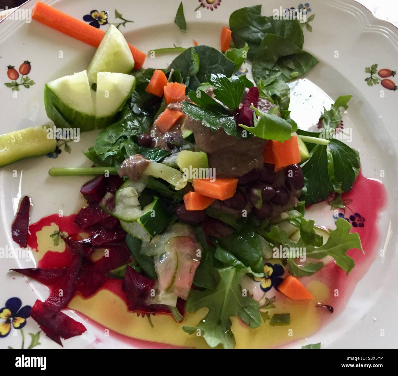 Black bean salad with fresh greens and beets - Smartphone Captured Stock Image