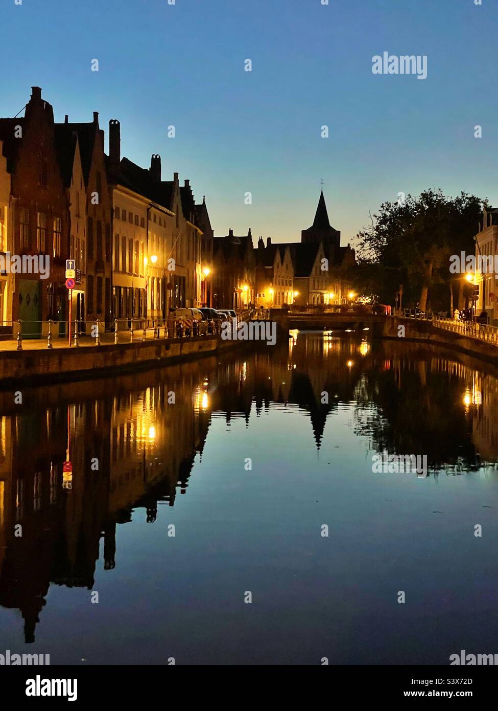 Evening reflections in the canal at Bruges, Belgium. Stock Photo