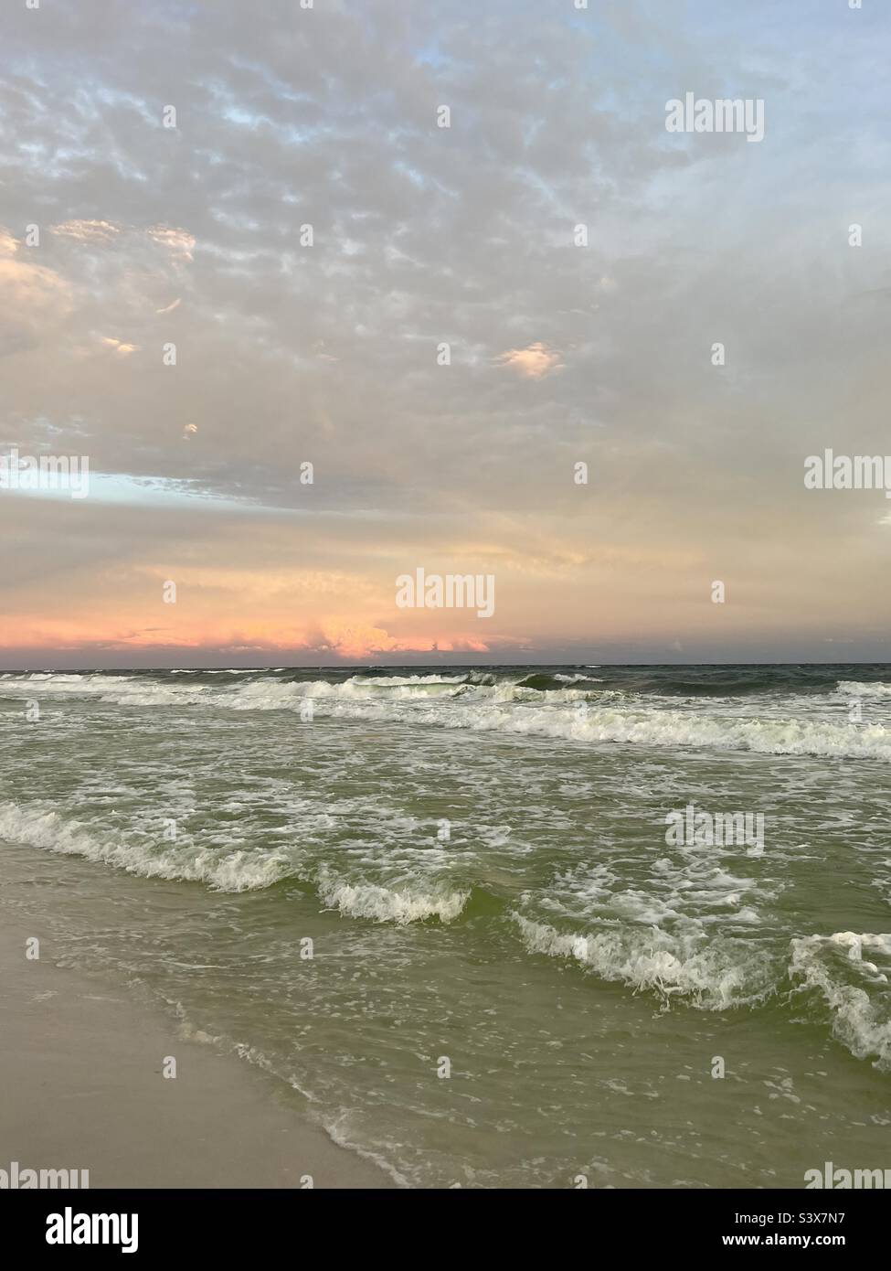 Soft pastel sunset sky Florida beach sunset - Smartphone Captured Stock Image