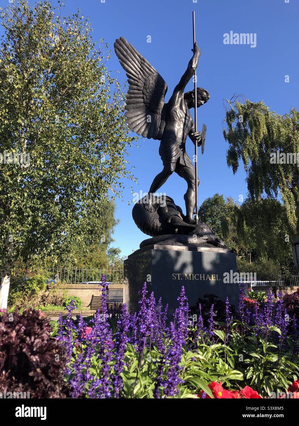 Sculpture of St Michael slaying the dragon, St Michael is depicted on the Linlithgow town coat of arms, Linlithgow, Scotland - Smartphone Captured Stock Image