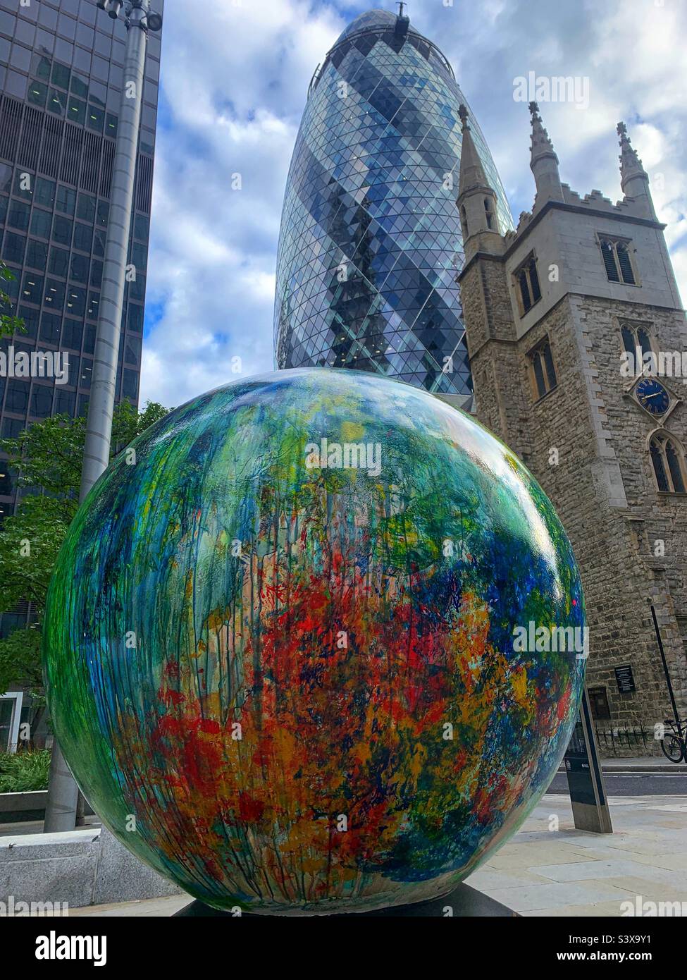 The world reimagined globe at The Gherkin - Smartphone Captured Stock Image
