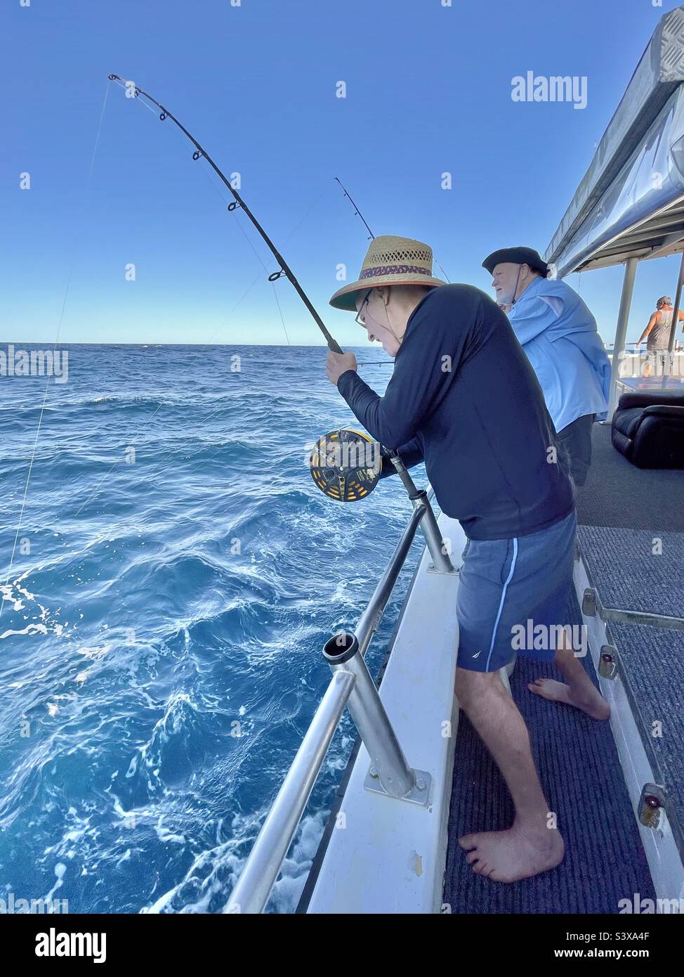 Deep sea line fishing from a charter boat near the Montebello Islands Indian  Ocean off north west coast of Western Australia Stock Photo - Alamy
