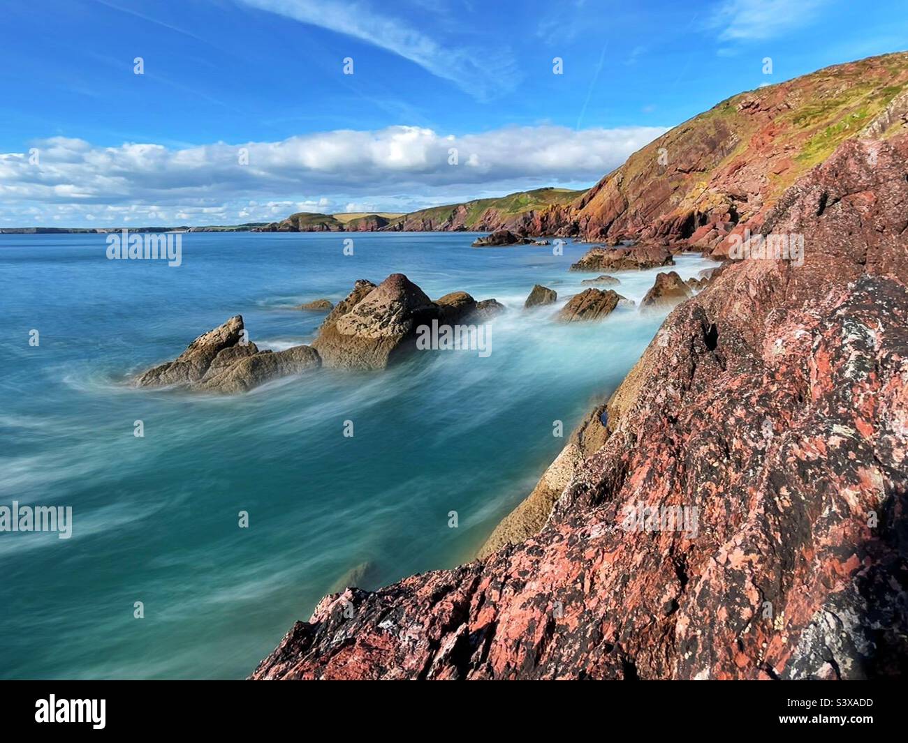 Looking west along the Pembrokeshire coast from Trewent Point, Freshwater East, Wakes, September. Stock Photo