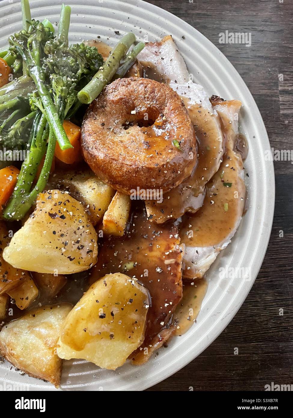 Sunday Dinner. Roast pork and all the trimmings Stock Photo Alamy