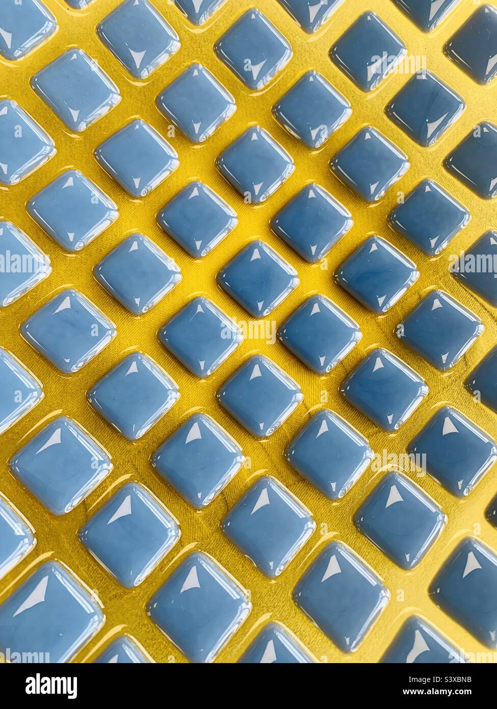 Abstract pattern yellow lines with blue squares - Smartphone Captured Stock Image