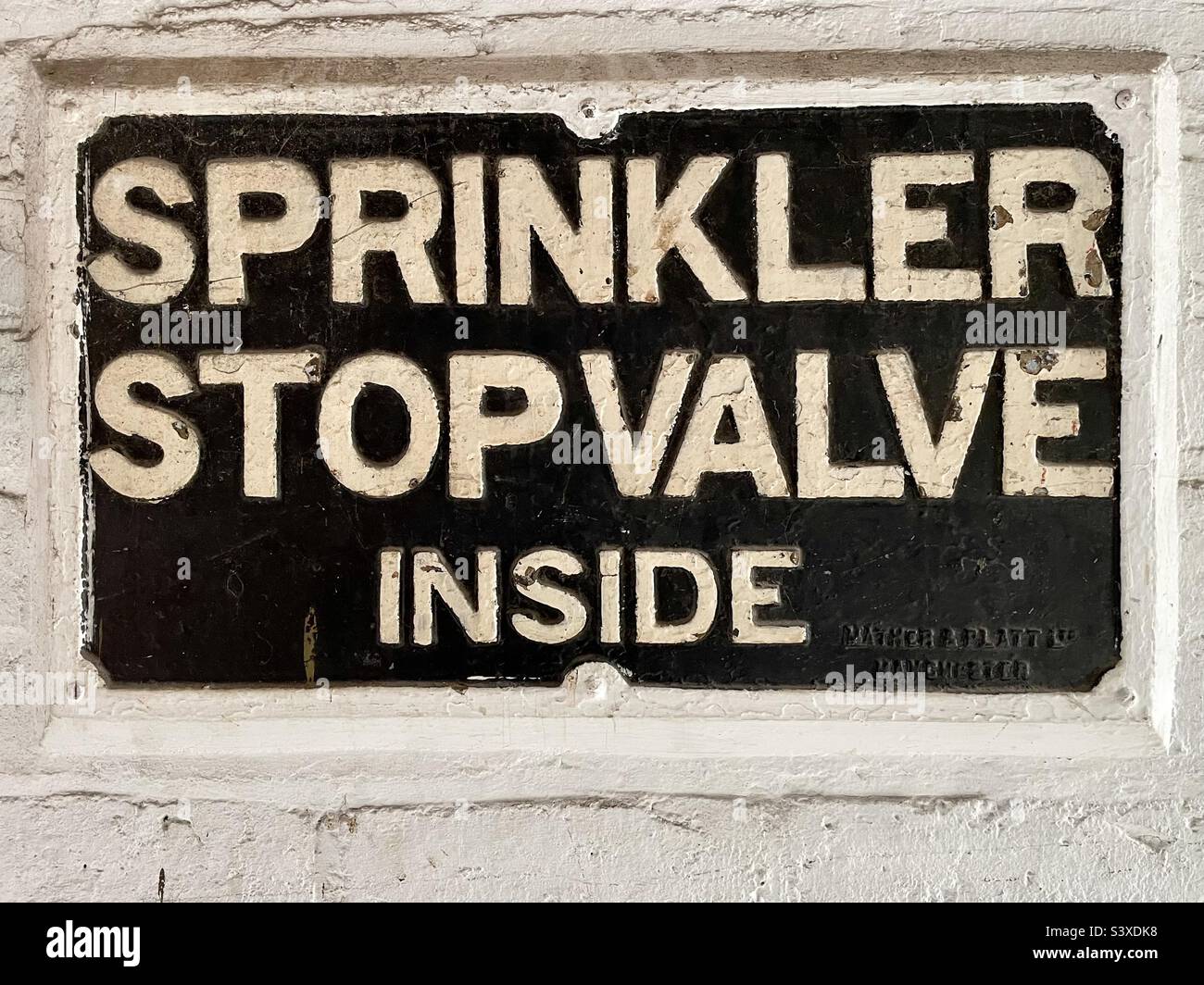 Old sprinkler stop valve sign - Smartphone Captured Stock Image